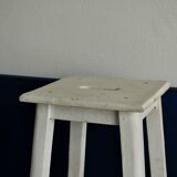 Old white wooden handle stool
