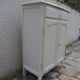 Small vintage buffet reimagined in pearl grey, wooden top.