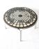 Black and white round coffee table with a mandala top and chrome metal base.