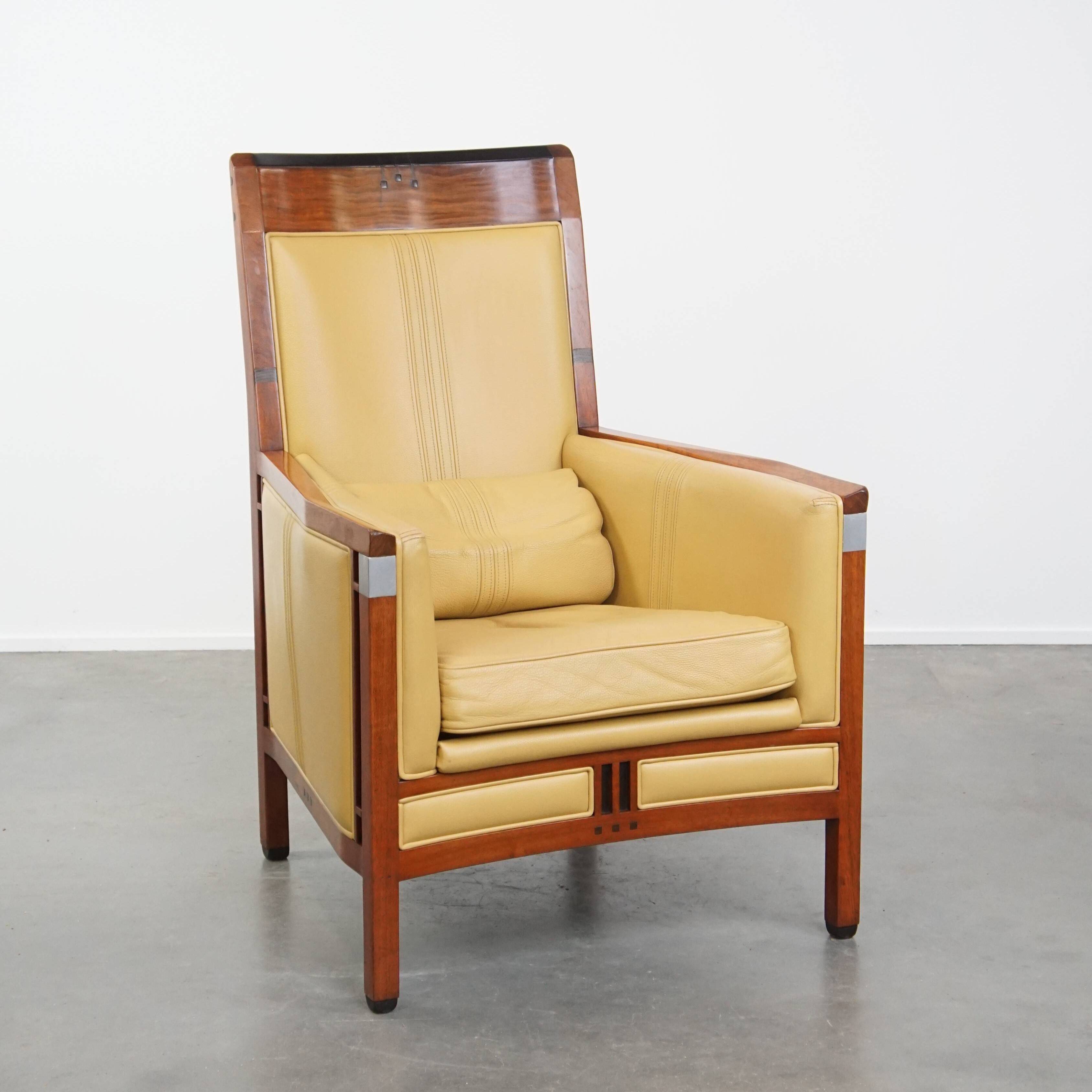 Art Deco armchair in yellow leather with high back