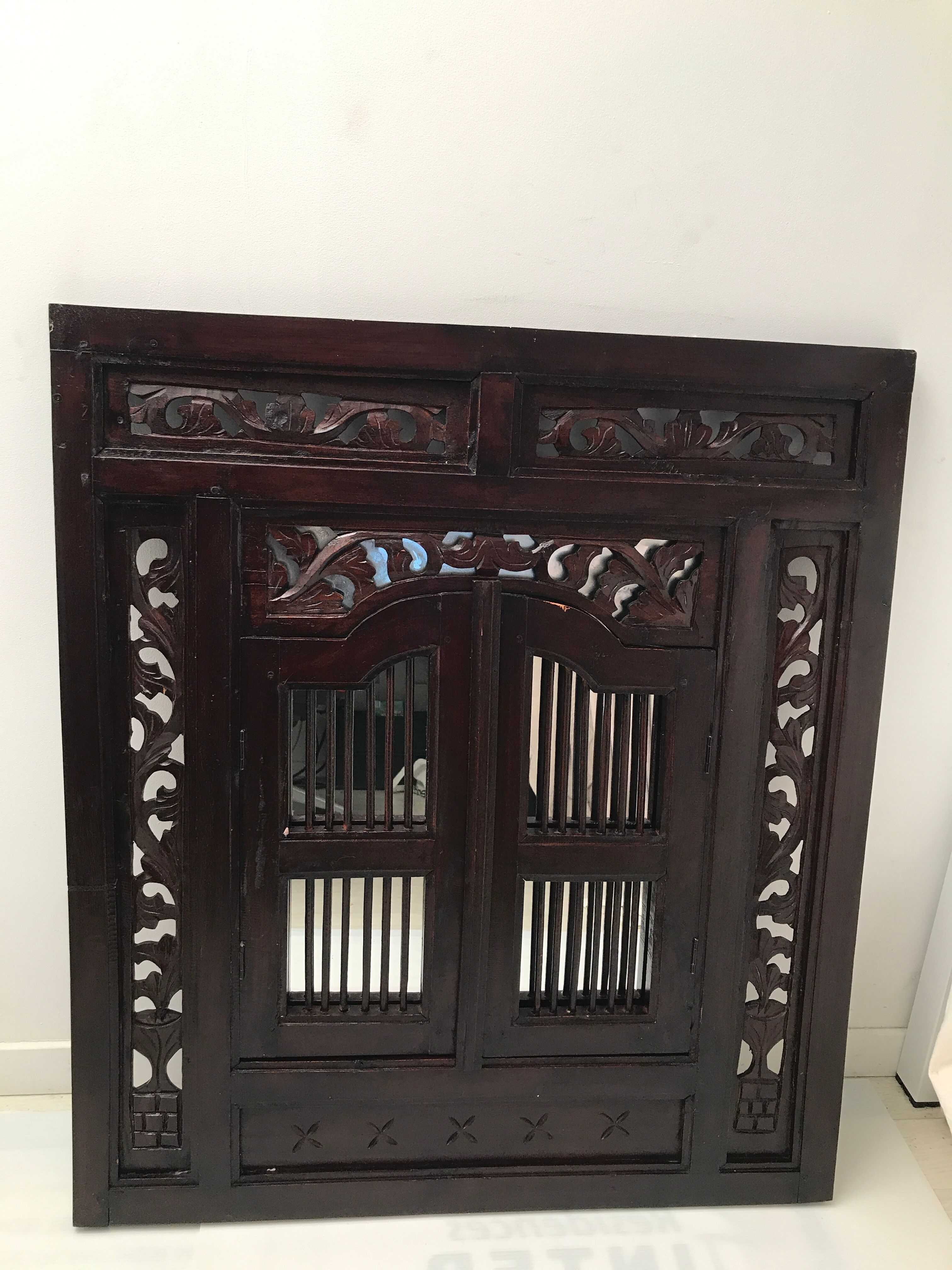 Vintage shuttered Indonesian mirror