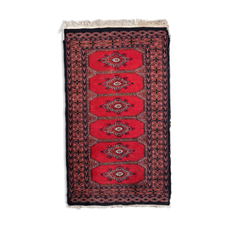 Vintage carpet Uzbek Bukhara handmade 62cm x 106cm 1970s