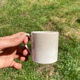 Duo of old beige Veillard Bordeaux coffee cups