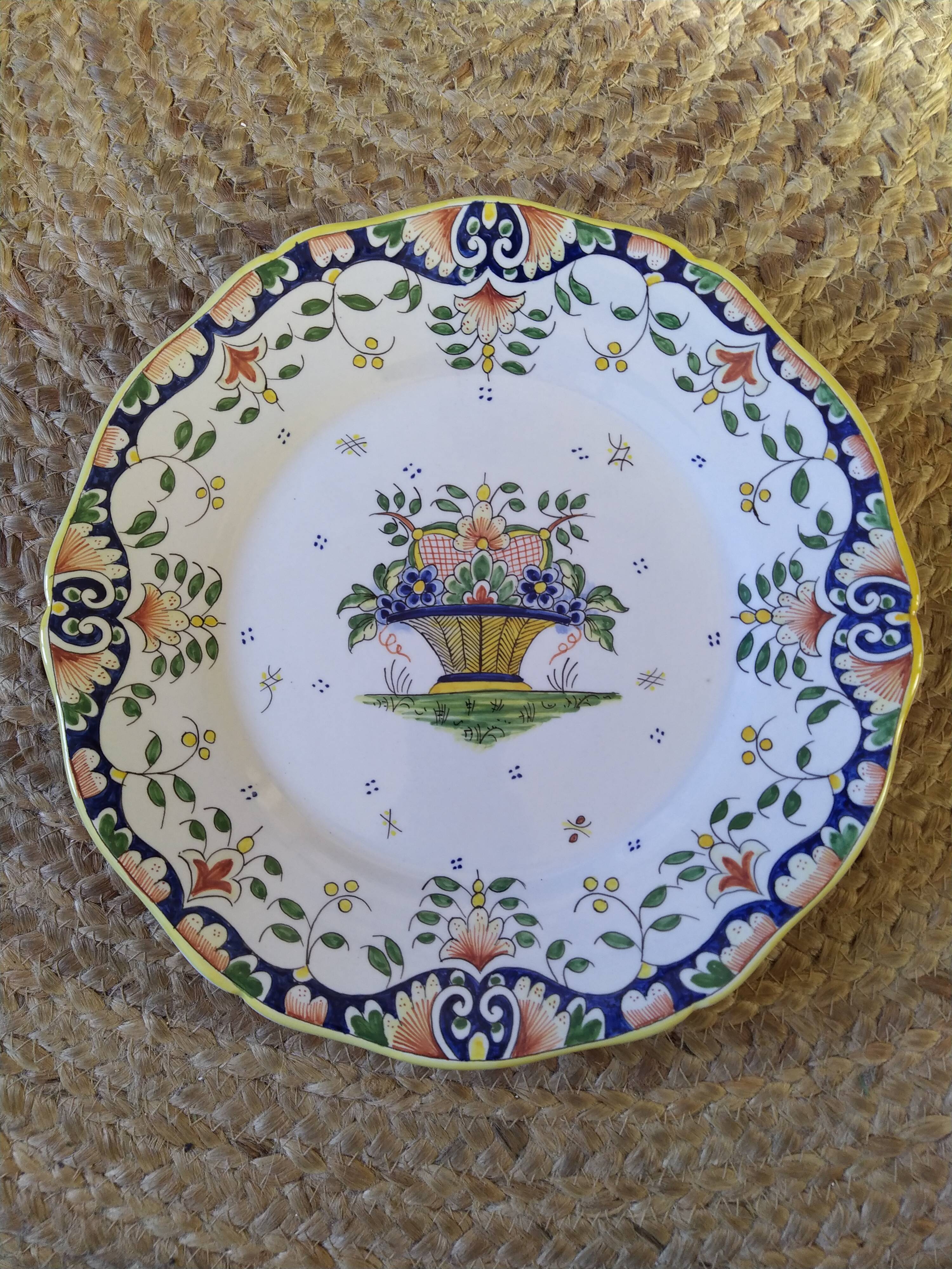 Decorative earthenware plate by René Delarue