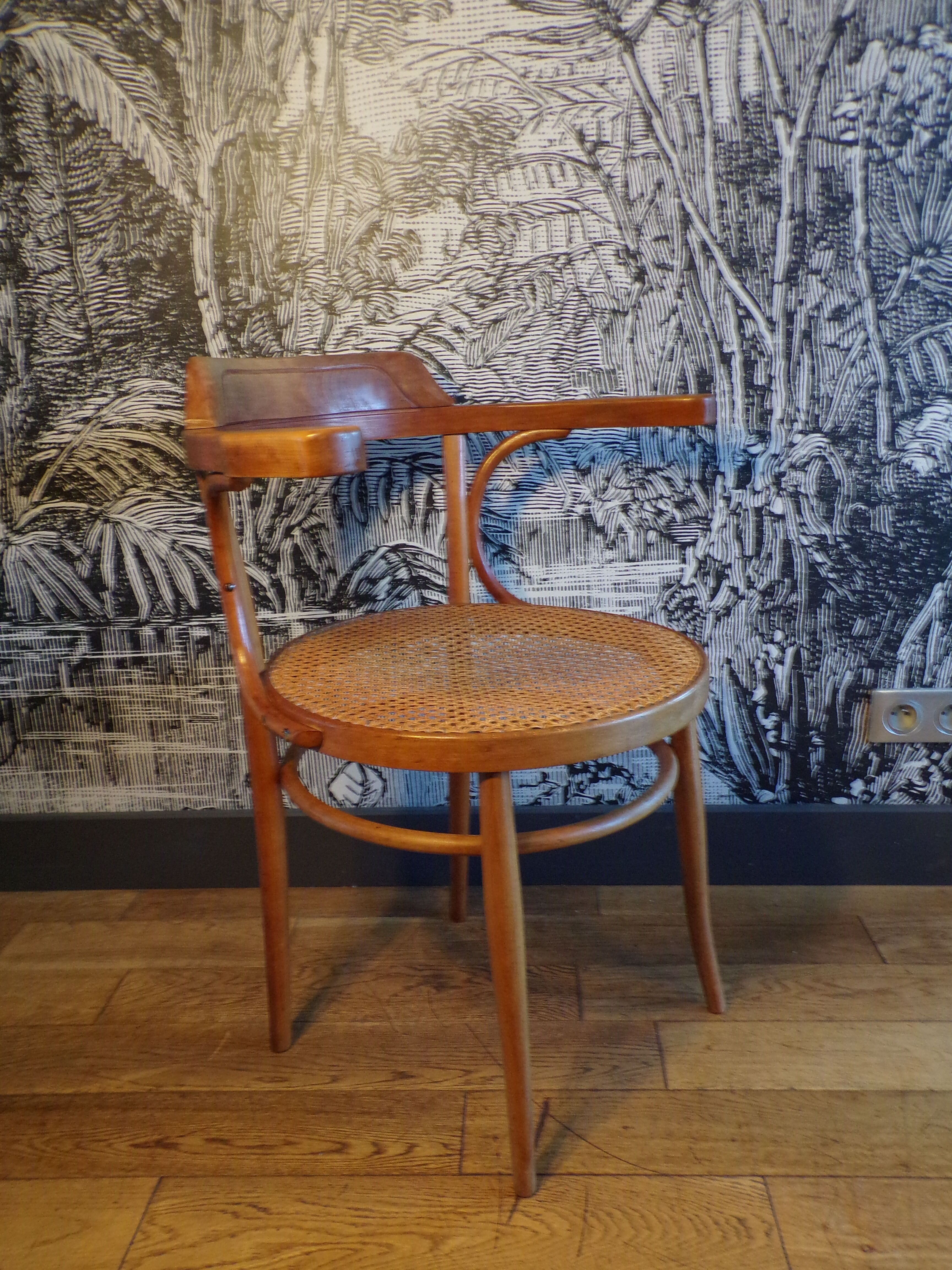 Vintage curved wood armchair