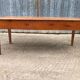 Antique cherry farmhouse table with 2 drawers and 1 pull-out