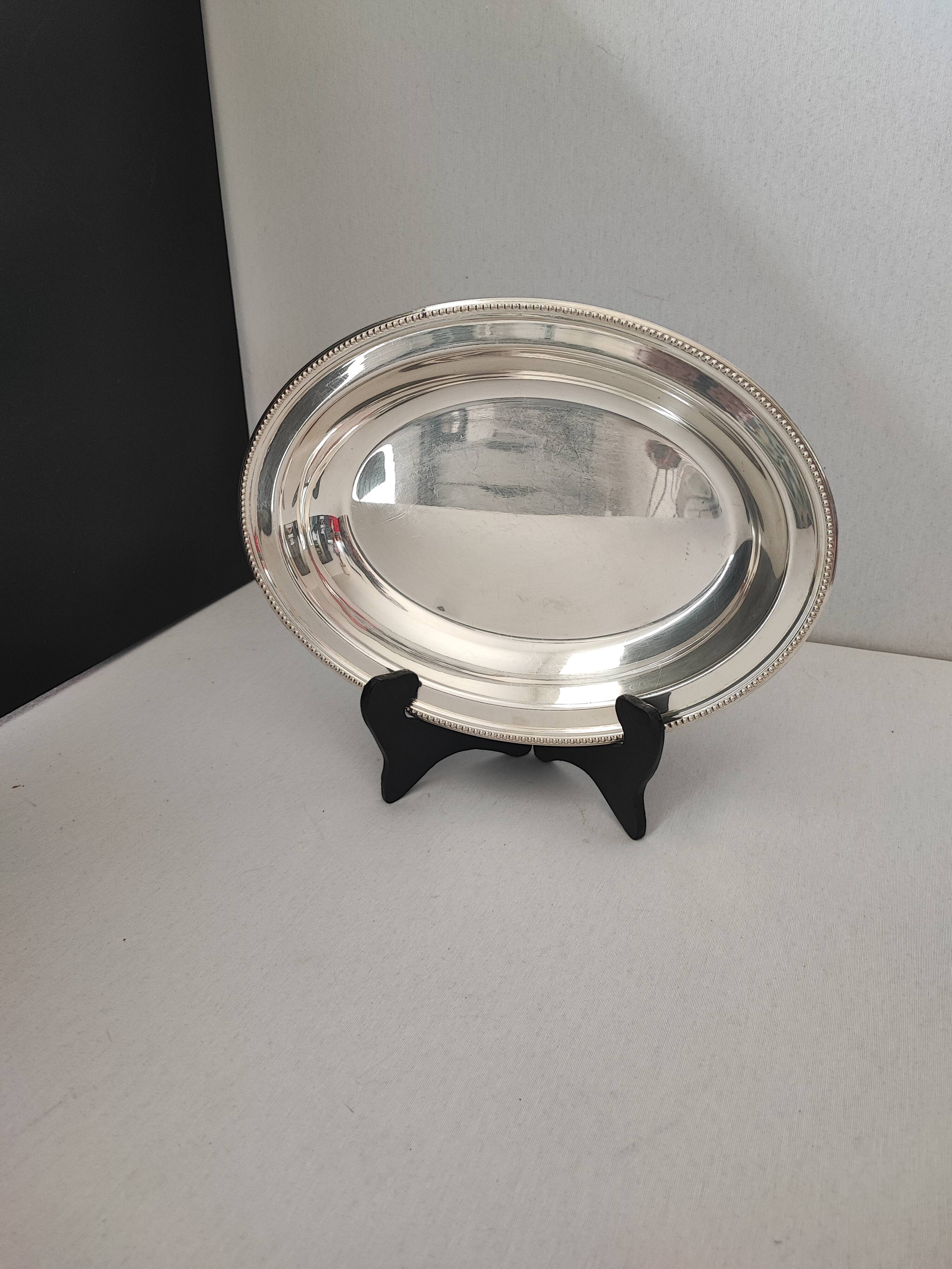 silver-plated metal salad bowl