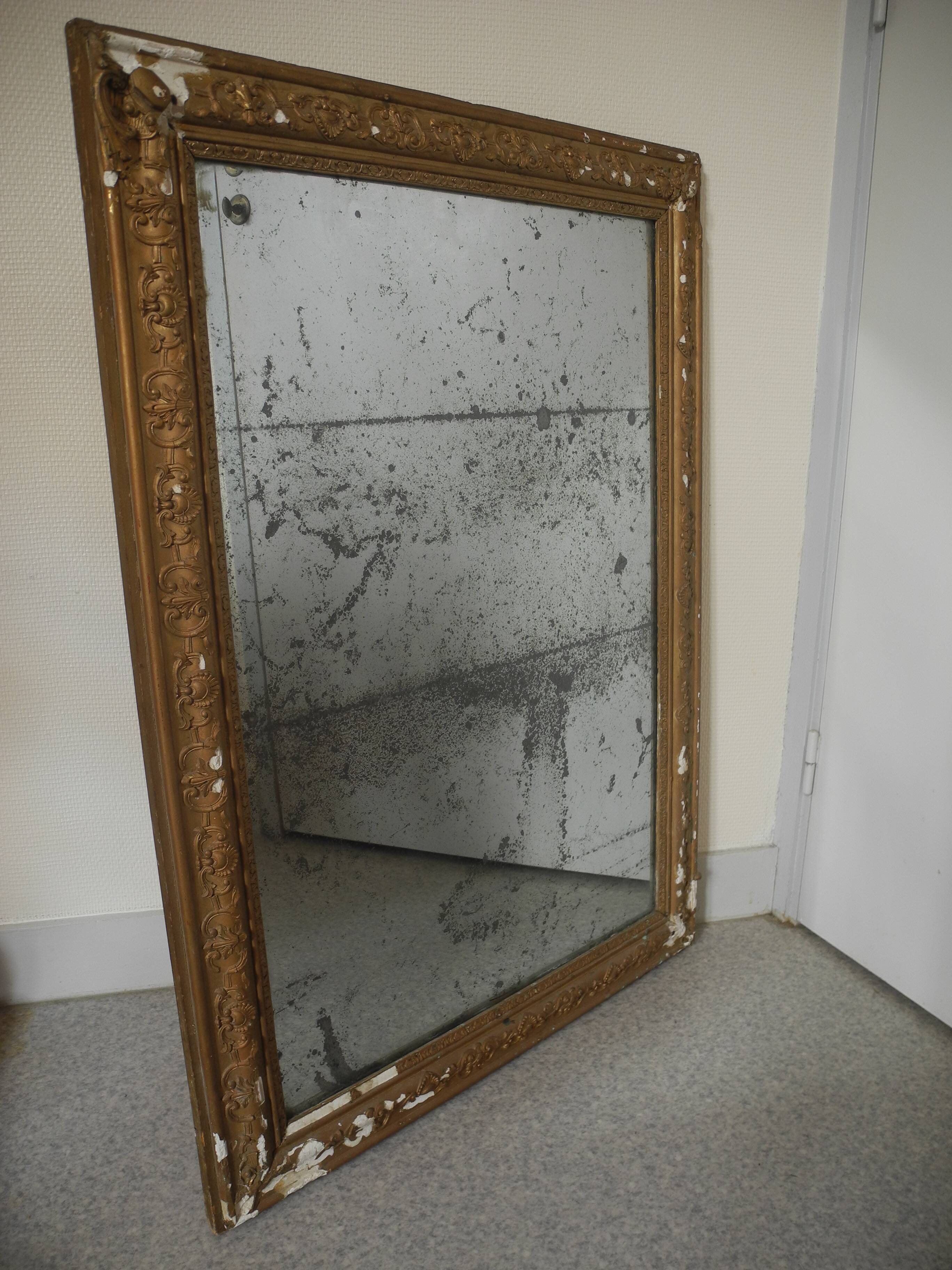 antique mercury mirror with gilded wood and stucco from the 19th century
