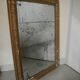 antique mercury mirror with gilded wood and stucco from the 19th century