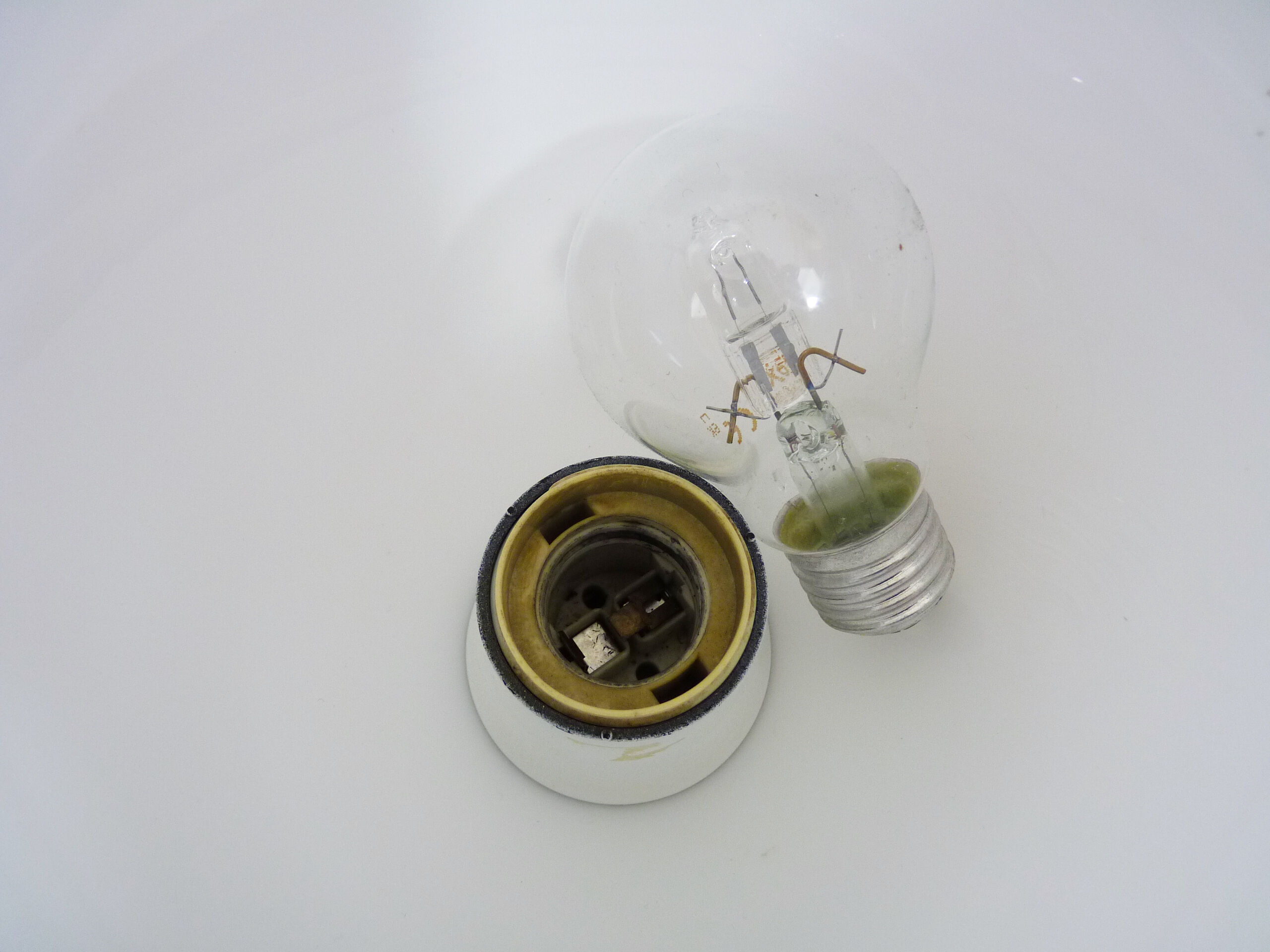 Mazda lamp in gilded metal, foot imitation wood and white opaline. Year 60
