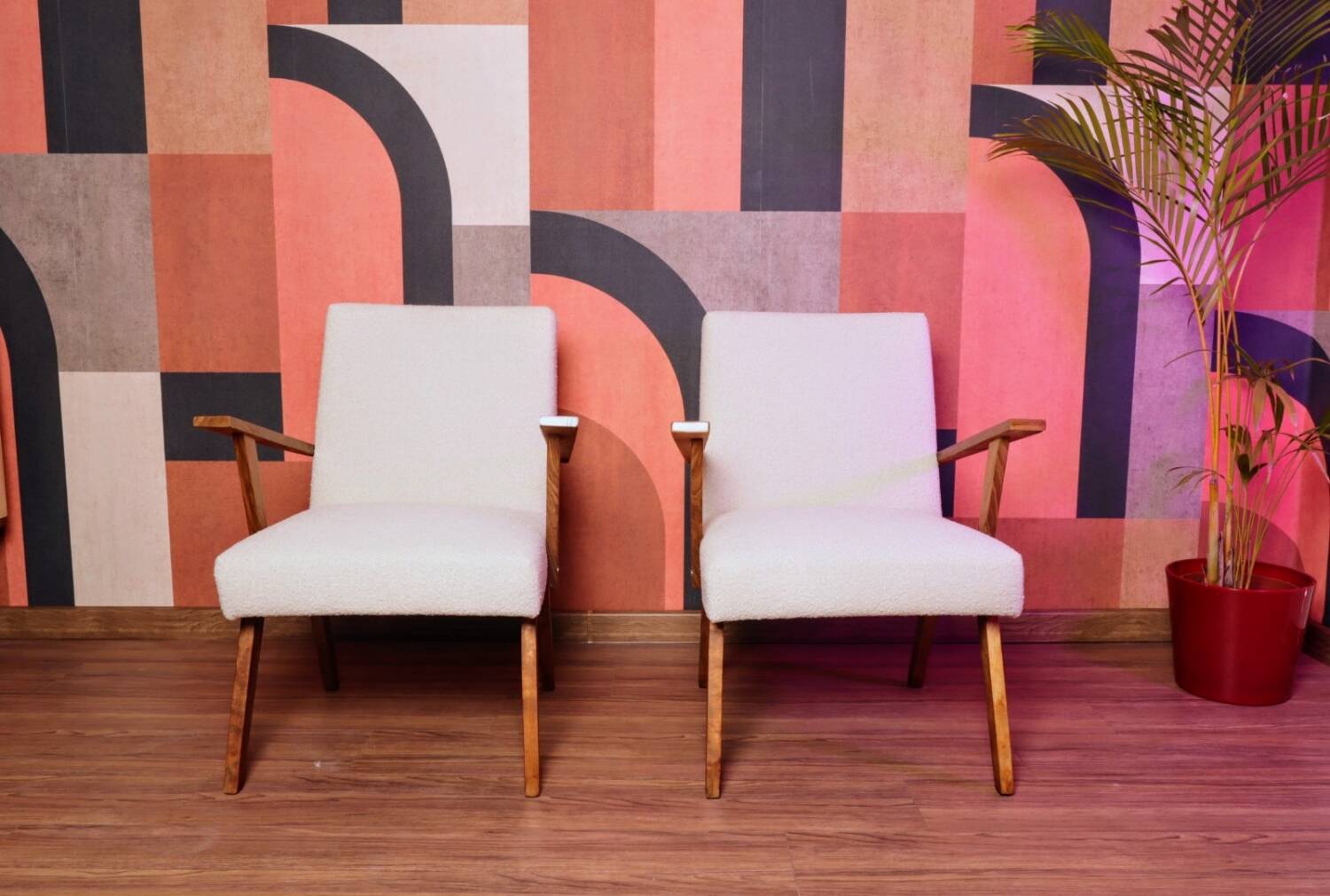 Vintage beige bouclé armchair with walnut wood from the 1950s.