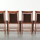 Elegant set of four black cowhide and wooden Art Deco dining chairs