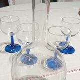 Old carafe and its wine glasses