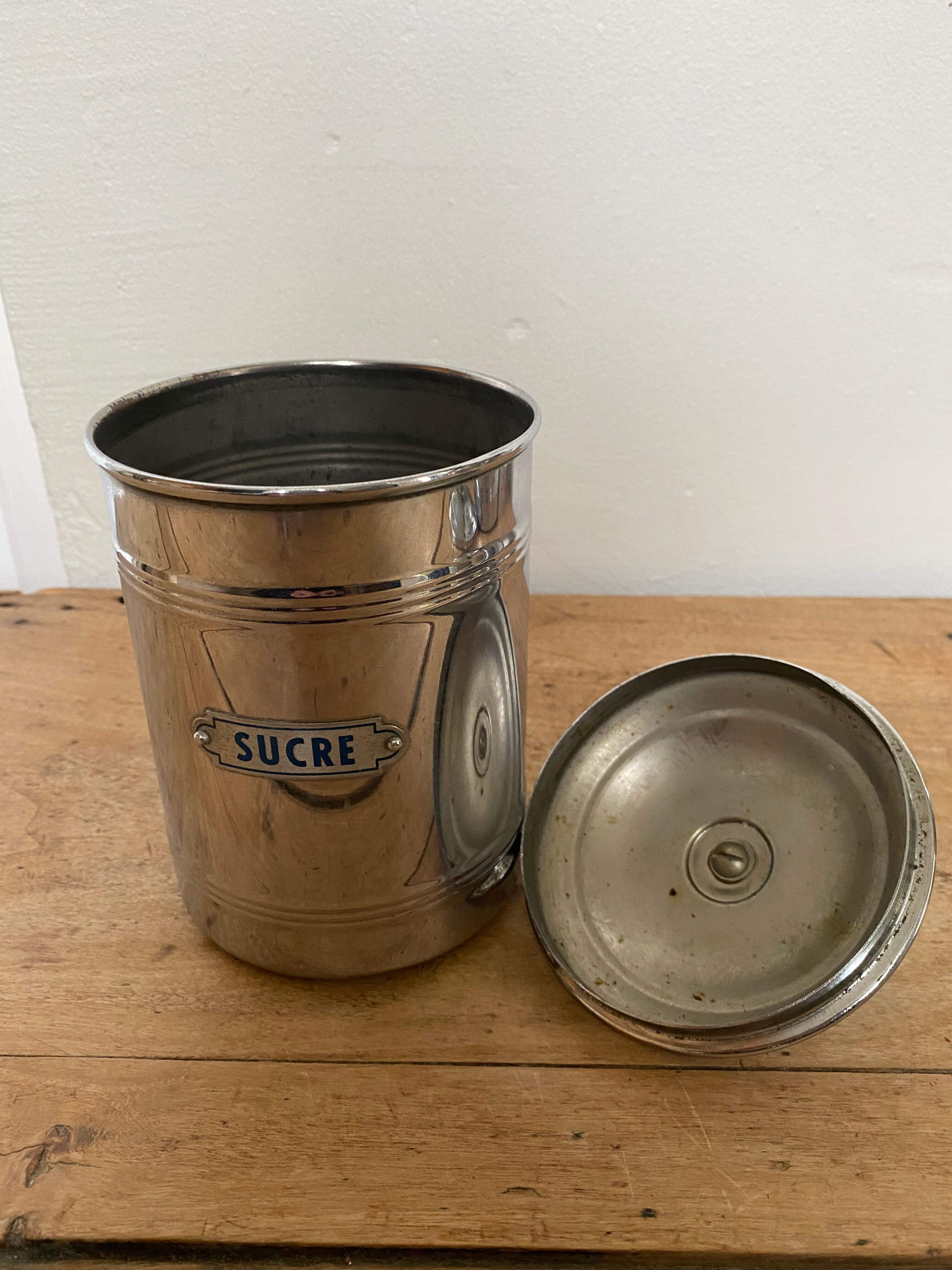 Set of two chrome-plated copper coffee/sugar jars stamped