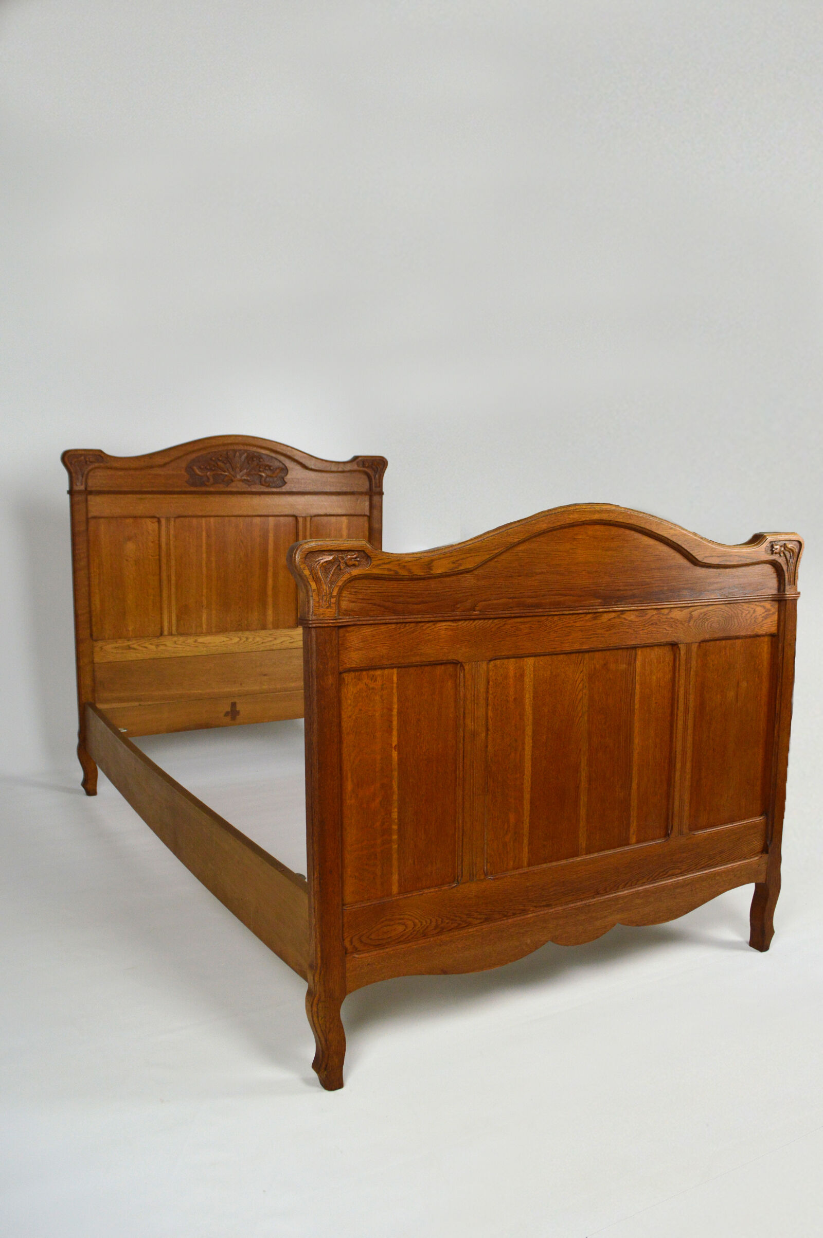 Art Nouveau twin beds in carved solid oak, France, circa 1910