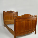 Art Nouveau twin beds in carved solid oak, France, circa 1910