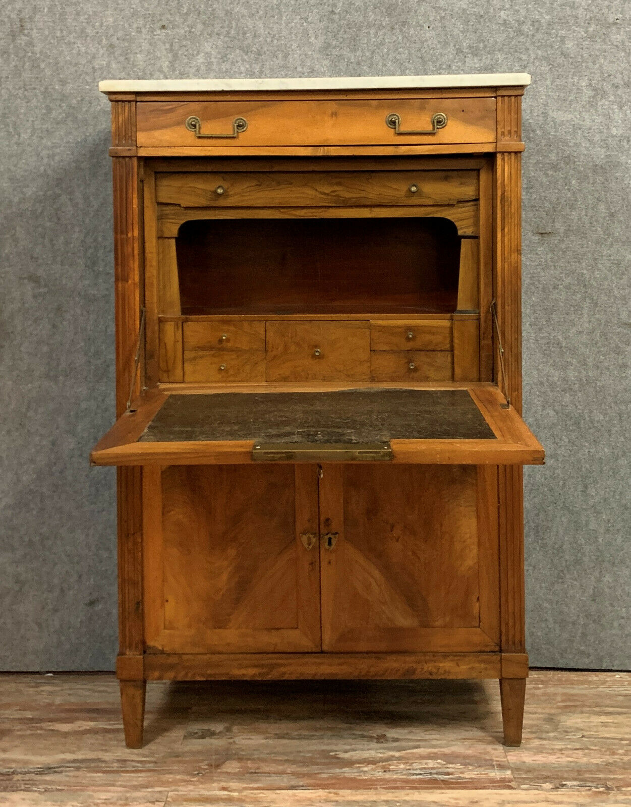 Louis XVI period secretary in blond mahogany around 1760