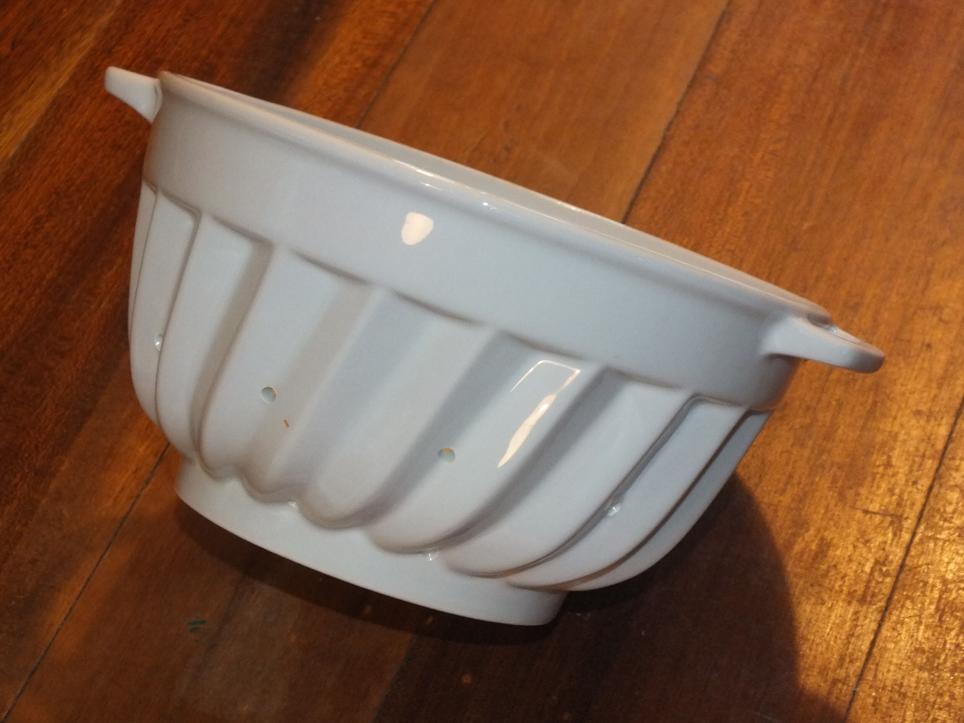 White porcelain strawberry strainer or drainer