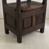 Fauteuil d’âtre formant coffre en chêne massif XVIIIème siècle