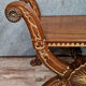 Bishop's curule armchair in solid walnut and gilding highlights with religious symbols