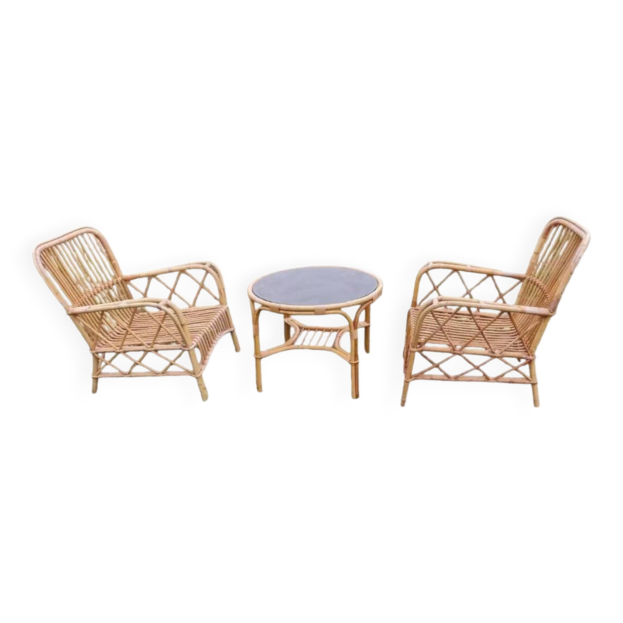 Vintage rattan garden furniture with cushions.