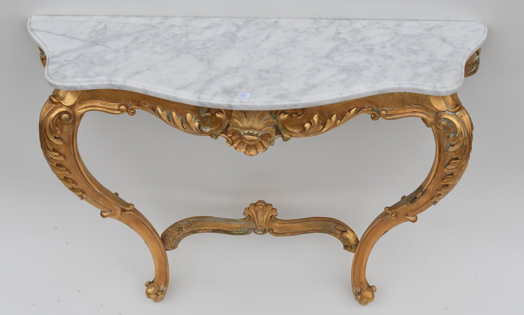Rocker-style gilded wooden console
