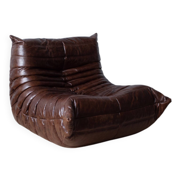 Togo armchair in dark brown shiny leather
