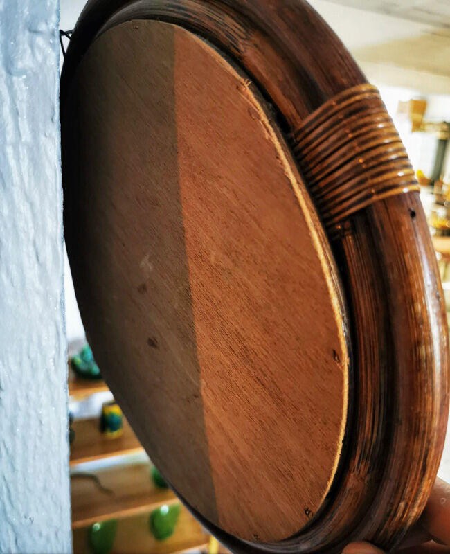 Round rattan mirror