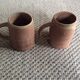 Series of 2 sandstone mugs