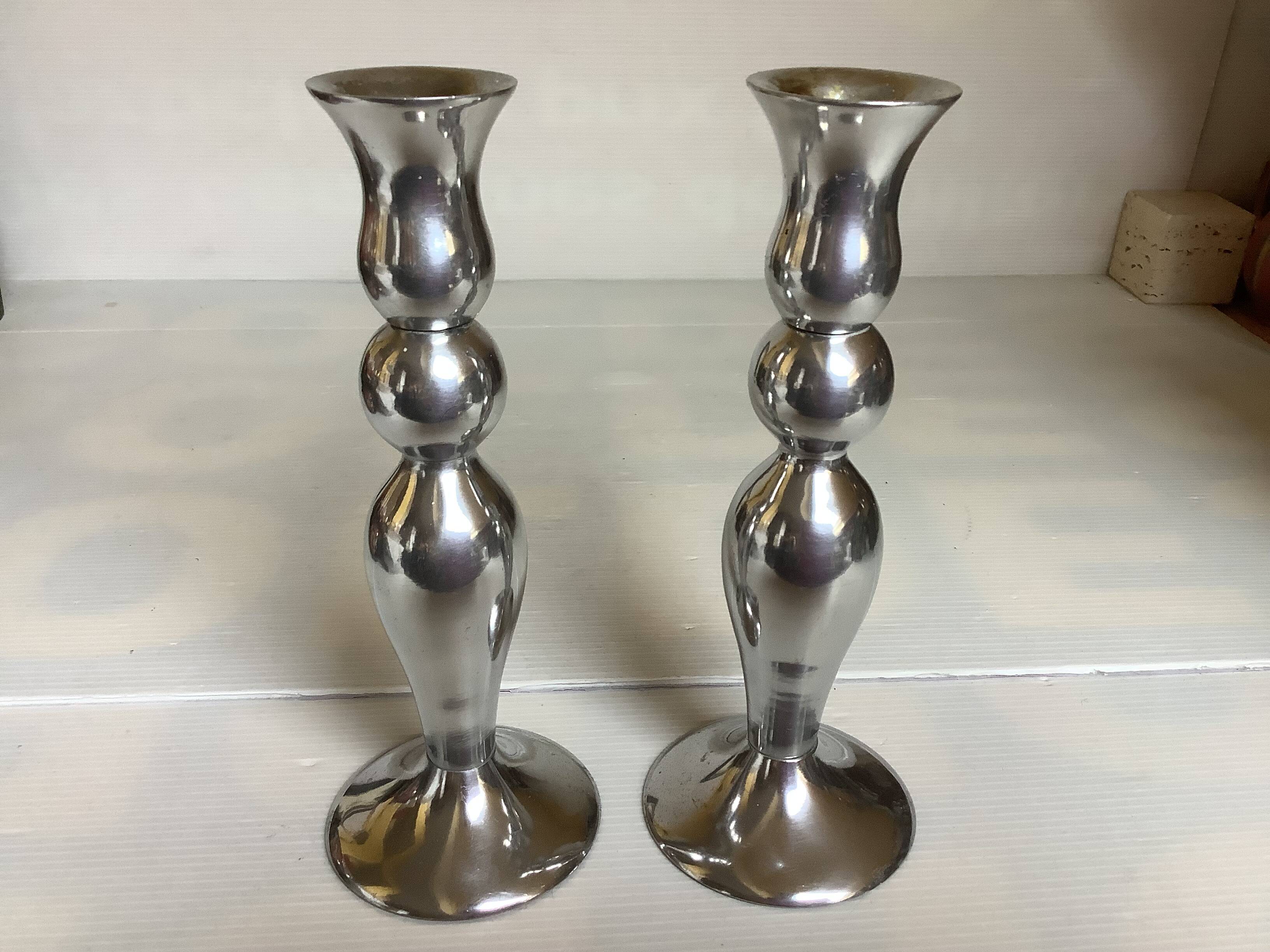 Pair of silver metal candlesticks