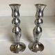 Pair of silver metal candlesticks