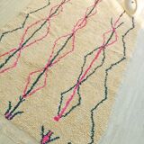 Boujaad Berber rug in pink and black colored wool woven in Morocco 220x140cm