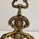 Pair of neoclassical andirons in bronze and wrought iron