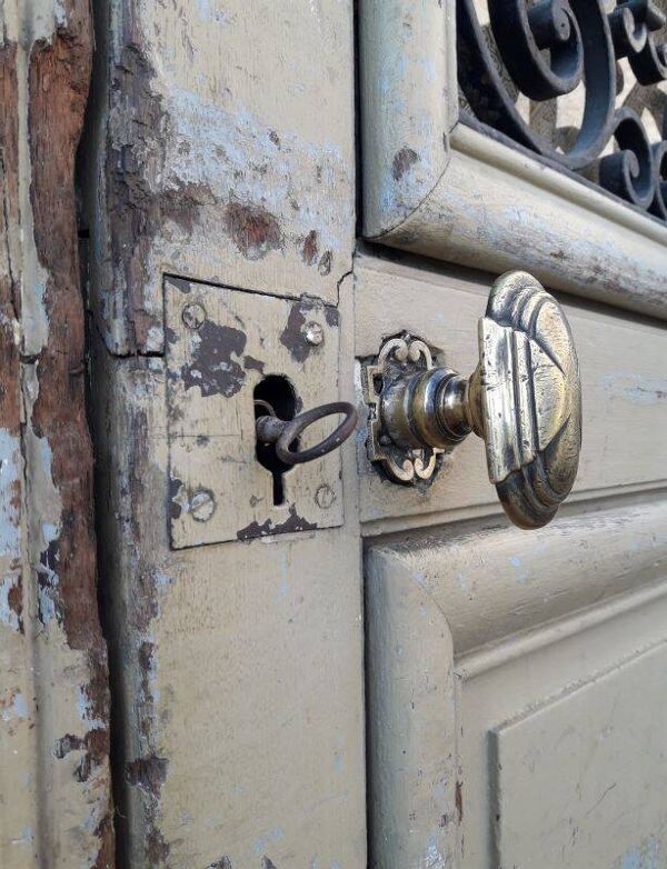 Porte d'entrée cintrée double en chêne, grilles et verre, XIXème