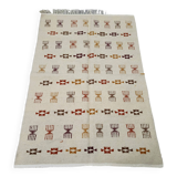 Handmade Berber patterned rug in natural wool
