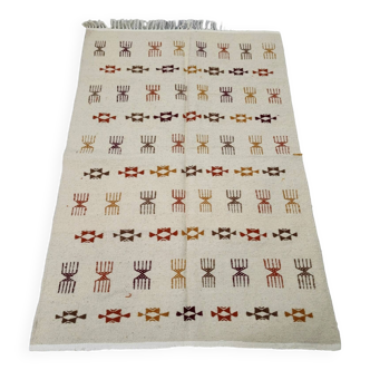 Handmade Berber patterned rug in natural wool