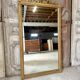 Miroir doré Louis XVI