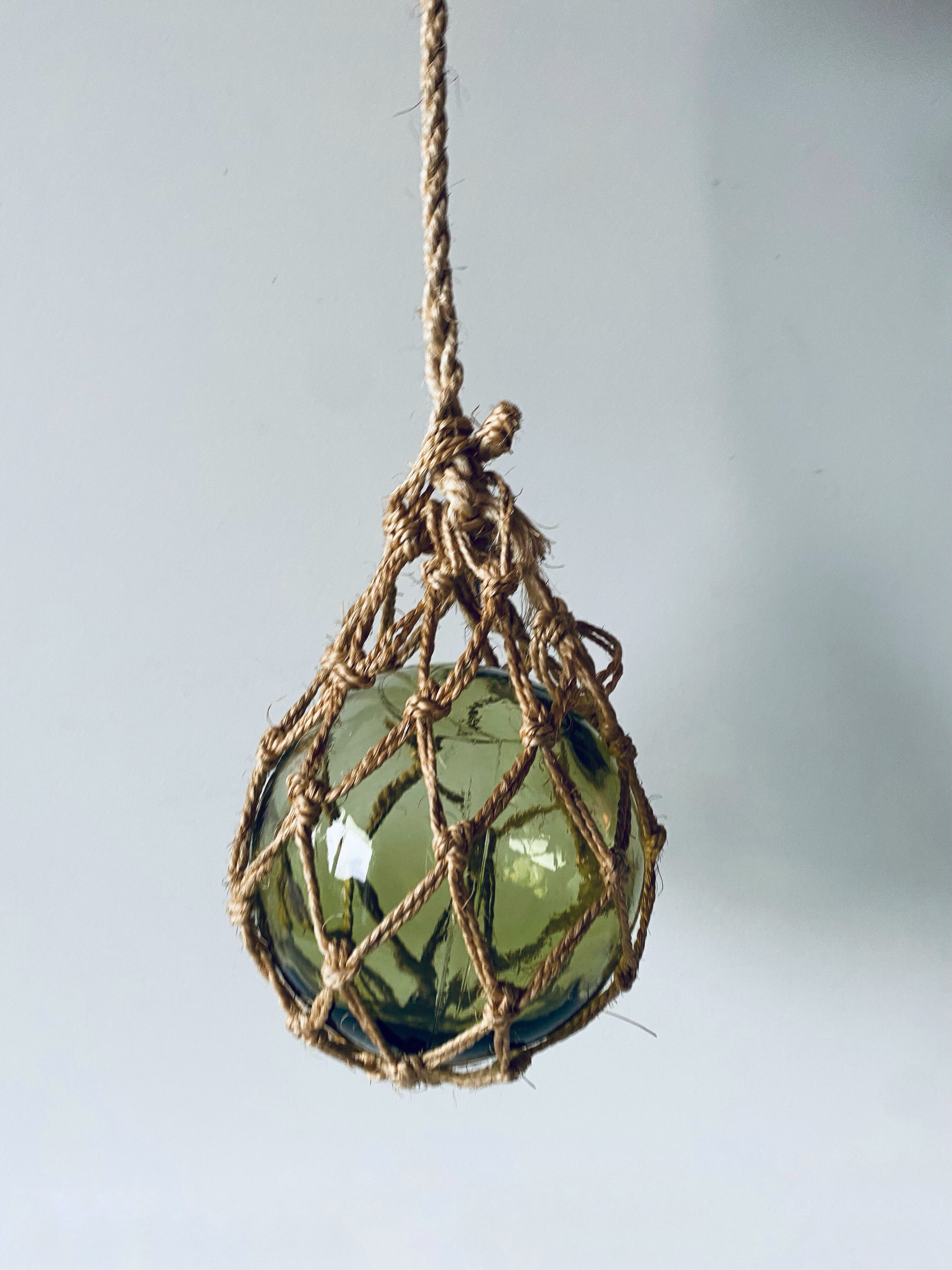 Old glass fishing float