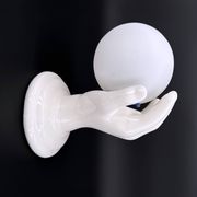 Vintage ceramic wall light - hand holding an opaline globe, 1970s