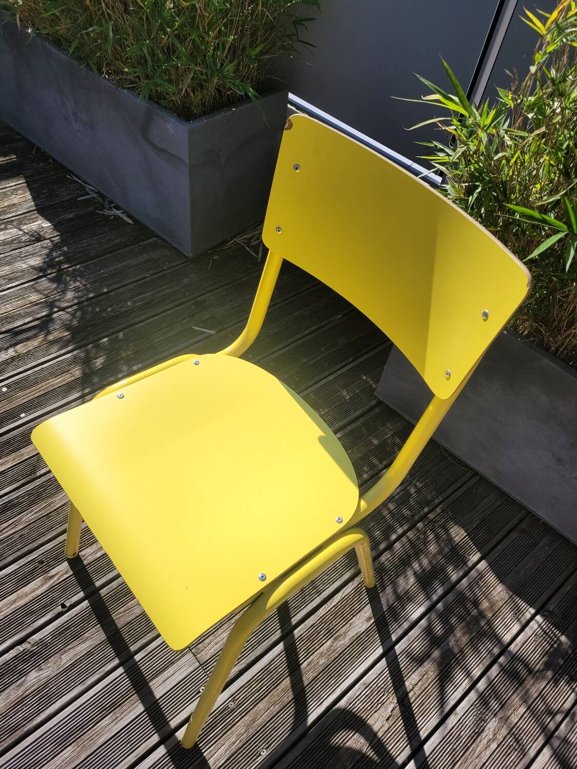 Pair of yellow plywood chairs