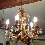 Very pretty chandelier with tassels and leaves in gold sheet metal.