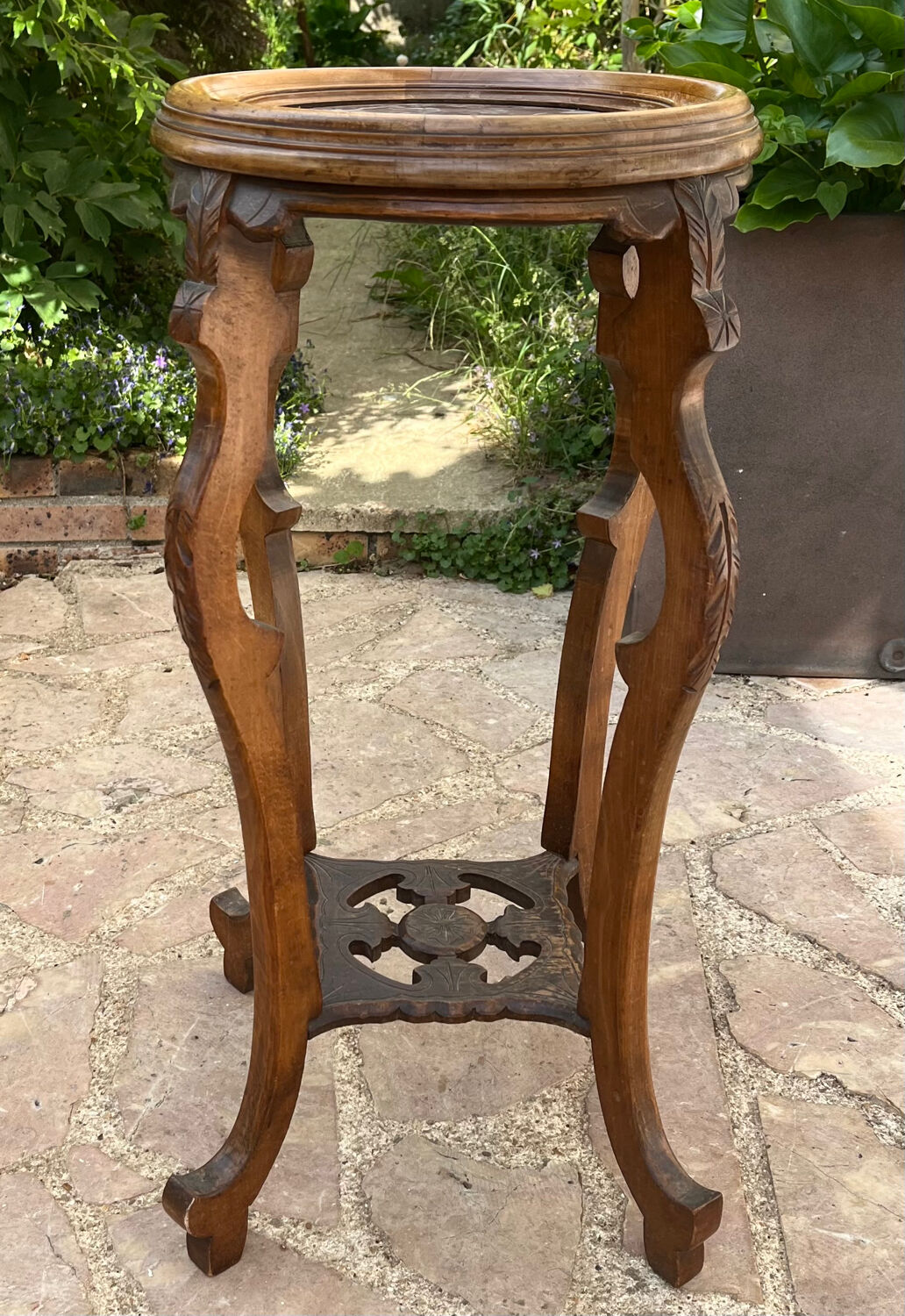 Old harness in wood with marble top