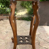 Old harness in wood with marble top