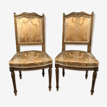 Pair of gilded wooden chairs, 19th century