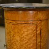 Empire gueridon in mottled maple with a blue stone top, 19th century.