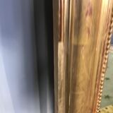 Louis Philippe's era mirror with a gold leaf pediment