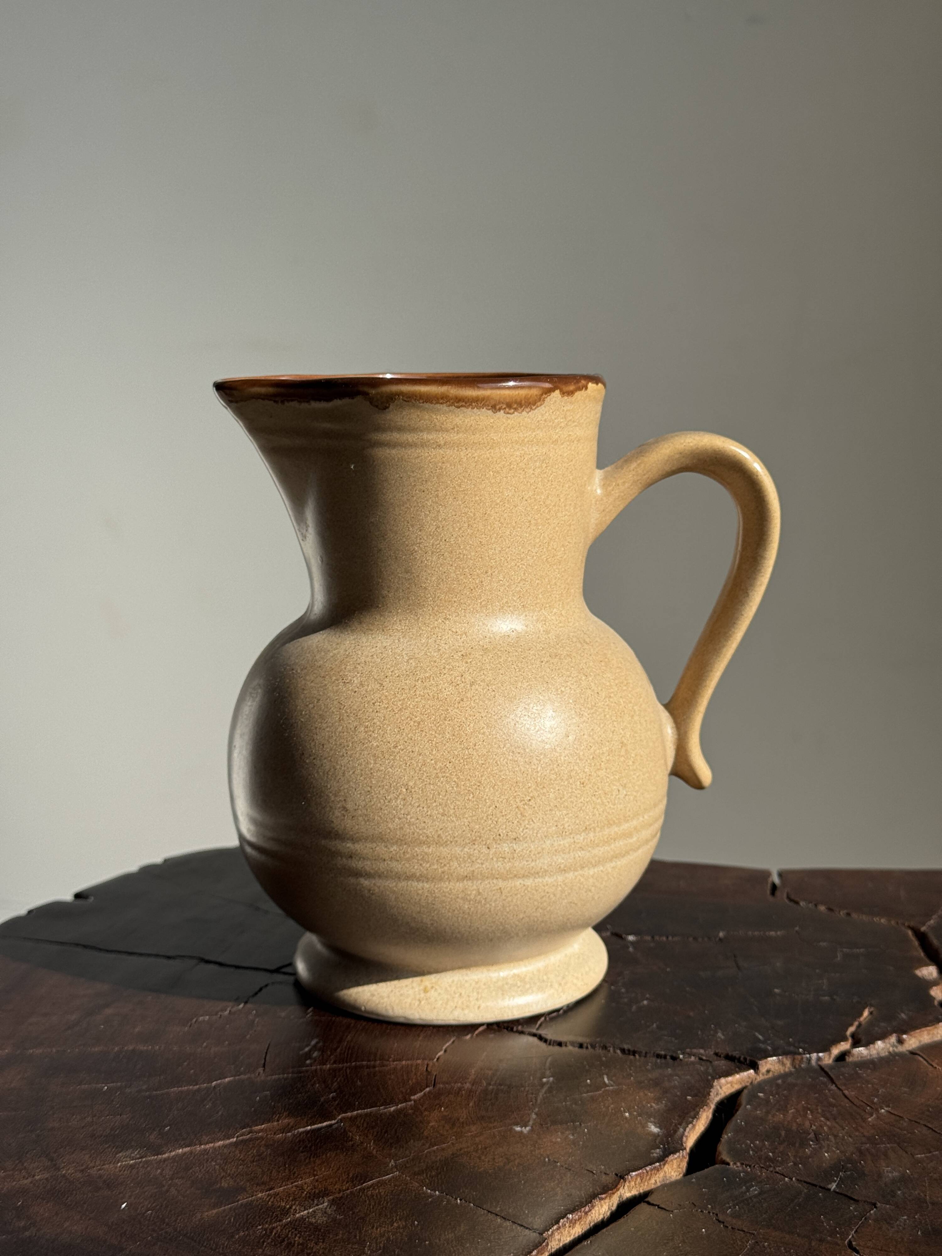 Vintage stoneware round carafe