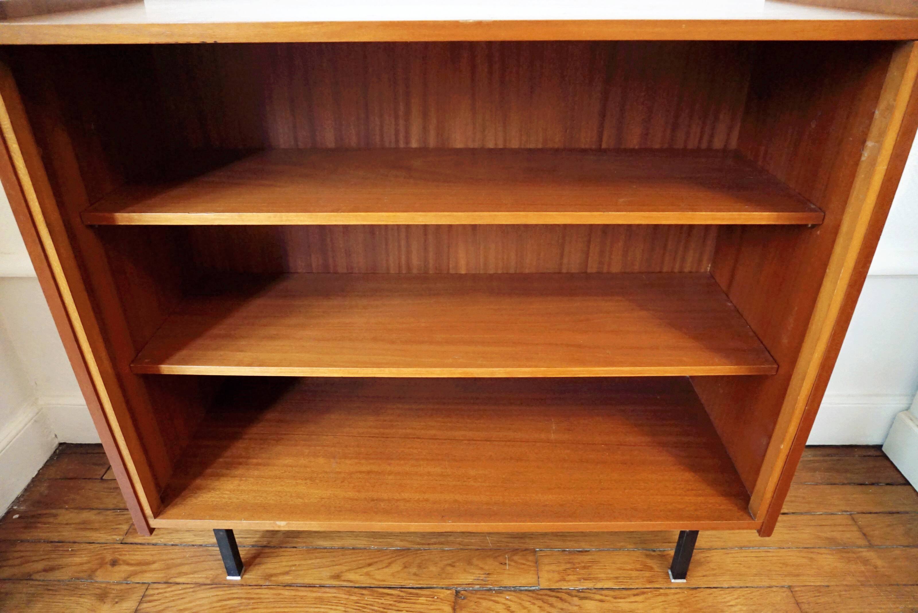 Vintage bookcase with metal feet