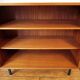 Vintage bookcase with metal feet