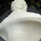 Alabaster bust of a woman signed Arnaldo Giannelli.